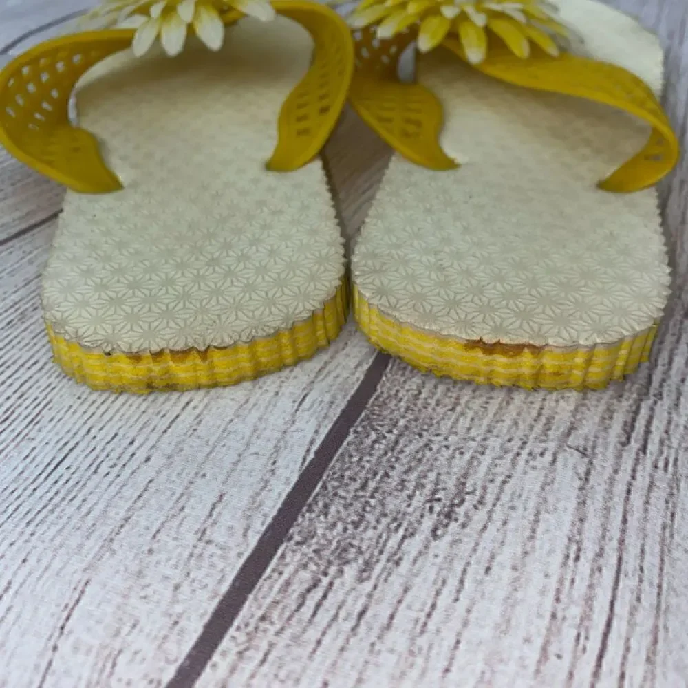 Vintage flip flops with plastic flower top perfect for manicures or just wearing